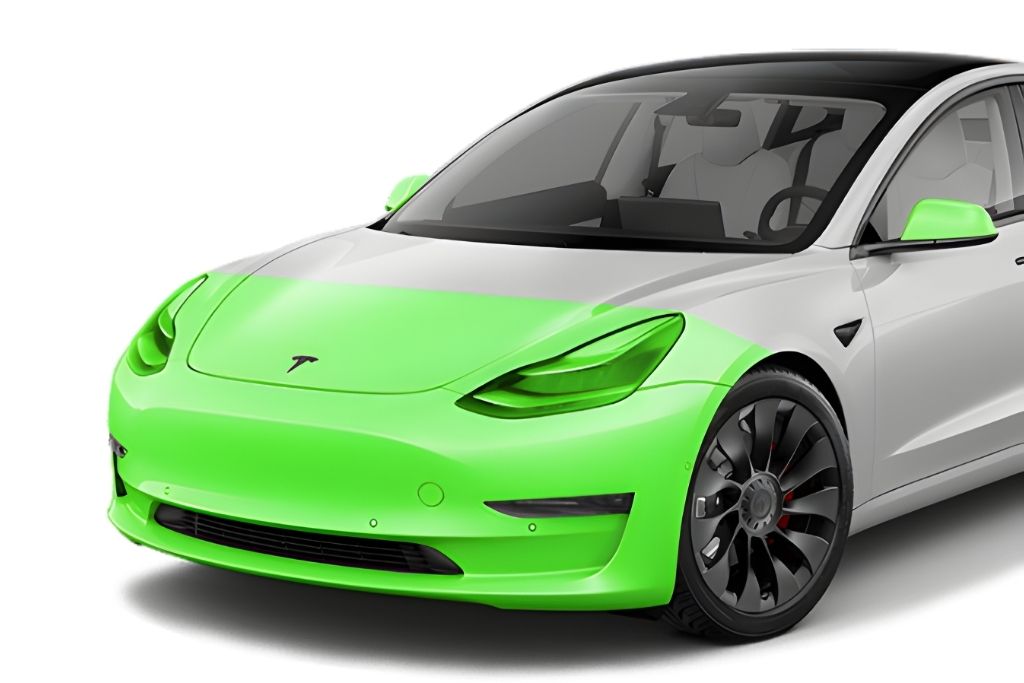 Digital rendering of a white Tesla with high-impact areas highlighted in green to show partial Paint Protection Film coverage, including the front bumper, hood, side mirrors, and fenders.